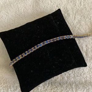 Sterling silver bracelet with blue stone